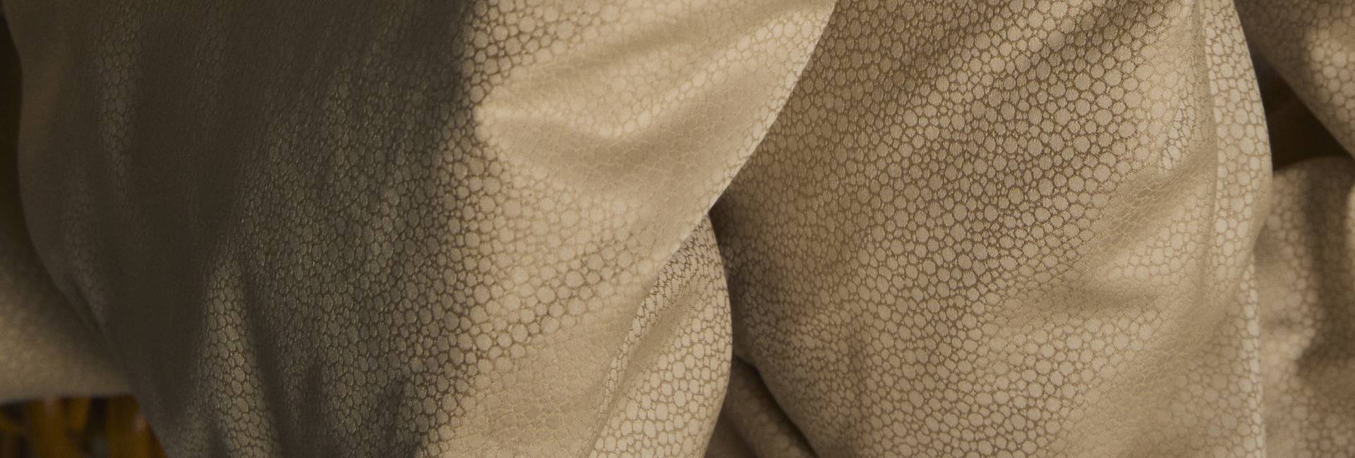 Close-up of textured beige fabric
